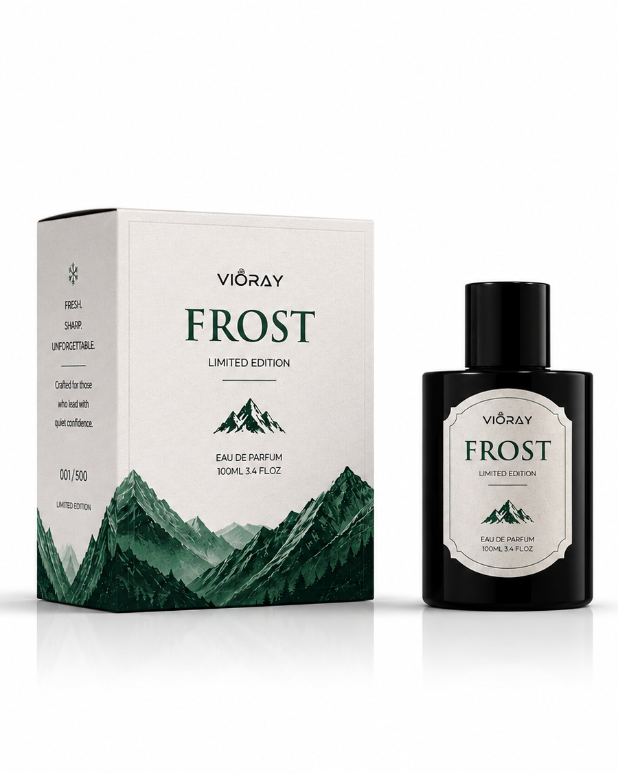 Vikray Frost perfume bottle and packaging with mountain design on a white background